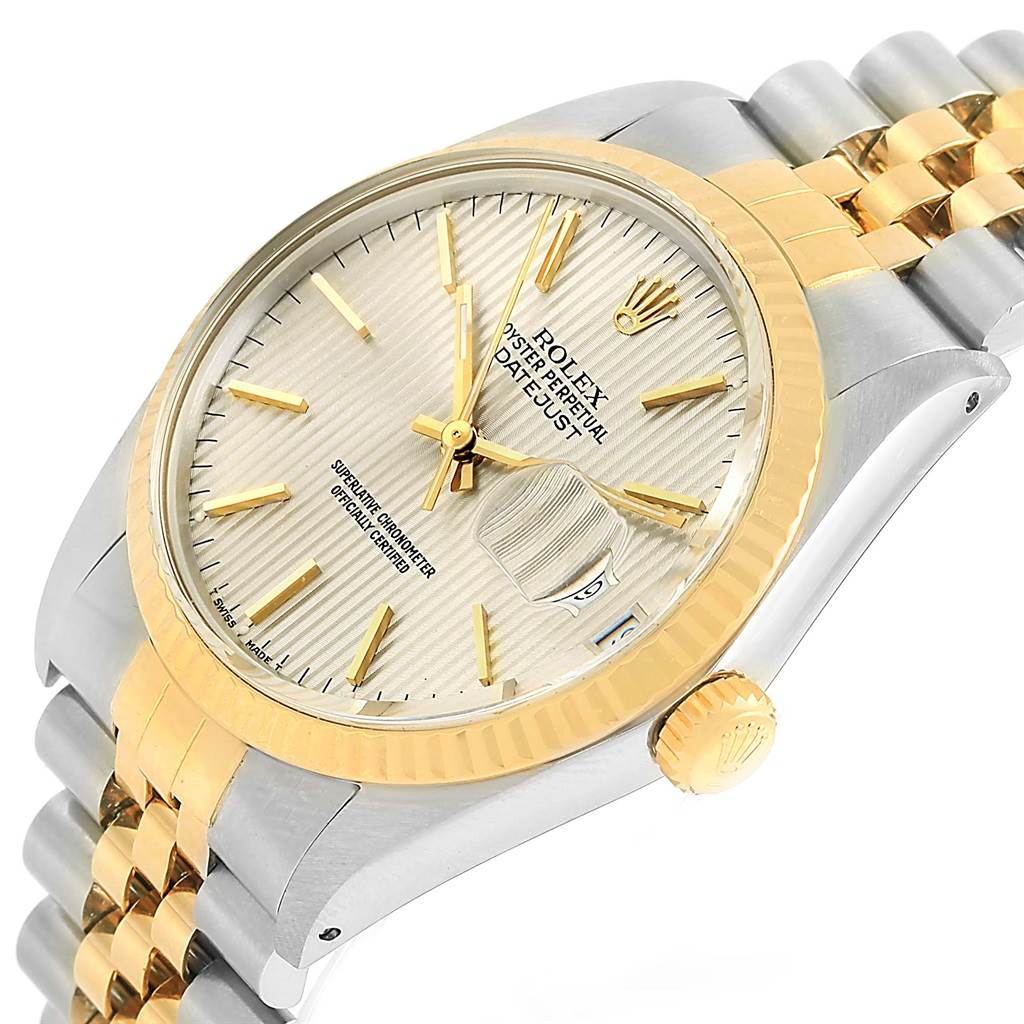 The Rolex Vintage Collection 16013 Men's Stainless Steel Silver Dial 16013 Men's Stainless Steel Silver Dial watch is shown at an angled close-up, highlighting the gold and silver bezel, dial, and part of the bracelet.