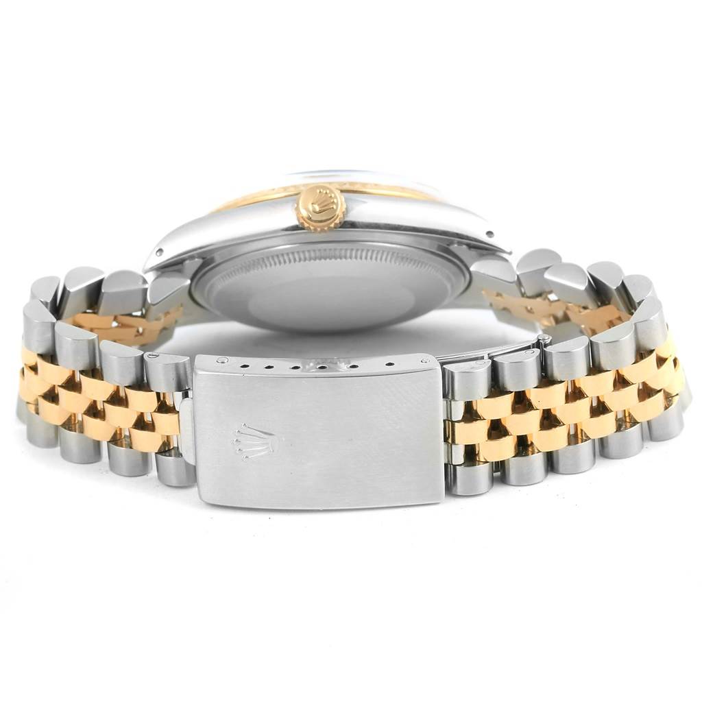 The image shows the back case and part of the bracelet of the Rolex Vintage Collection 16013 Men's Stainless Steel Silver Dial 16013 Men's Stainless Steel Silver Dial watch.