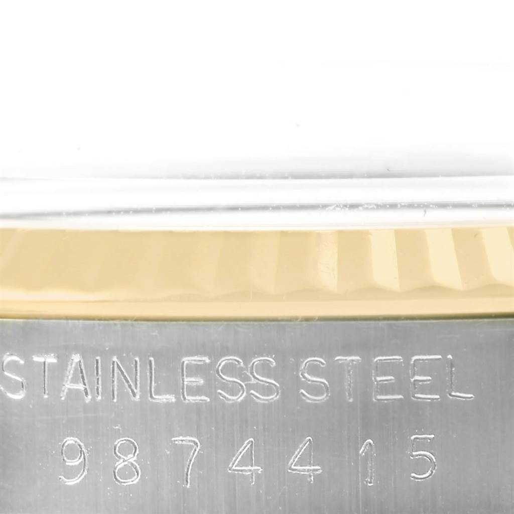 This close-up image shows the stainless steel and serial number section of a Rolex Vintage Collection 16013 Men's Stainless Steel Silver Dial 16013 Men's Stainless Steel Silver Dial watch.