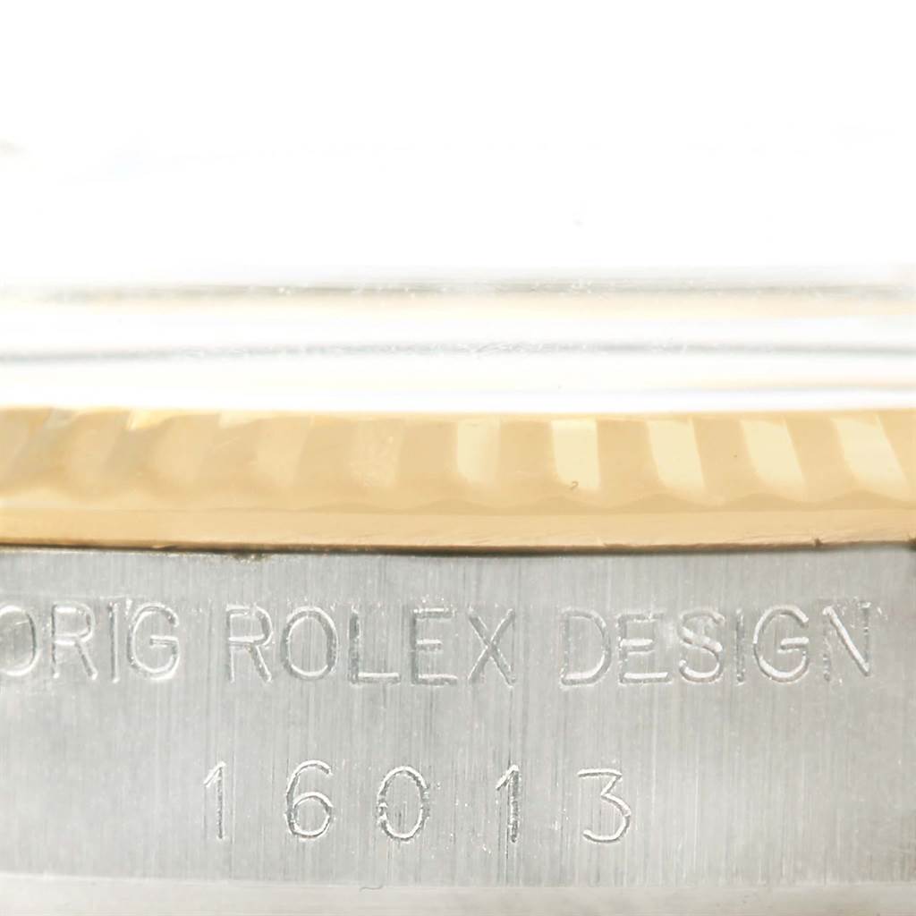 The image shows a close-up of the case side and bezel of the Vintage Collection model by Rolex, displaying "ORIG ROLEX DESIGN 16013."