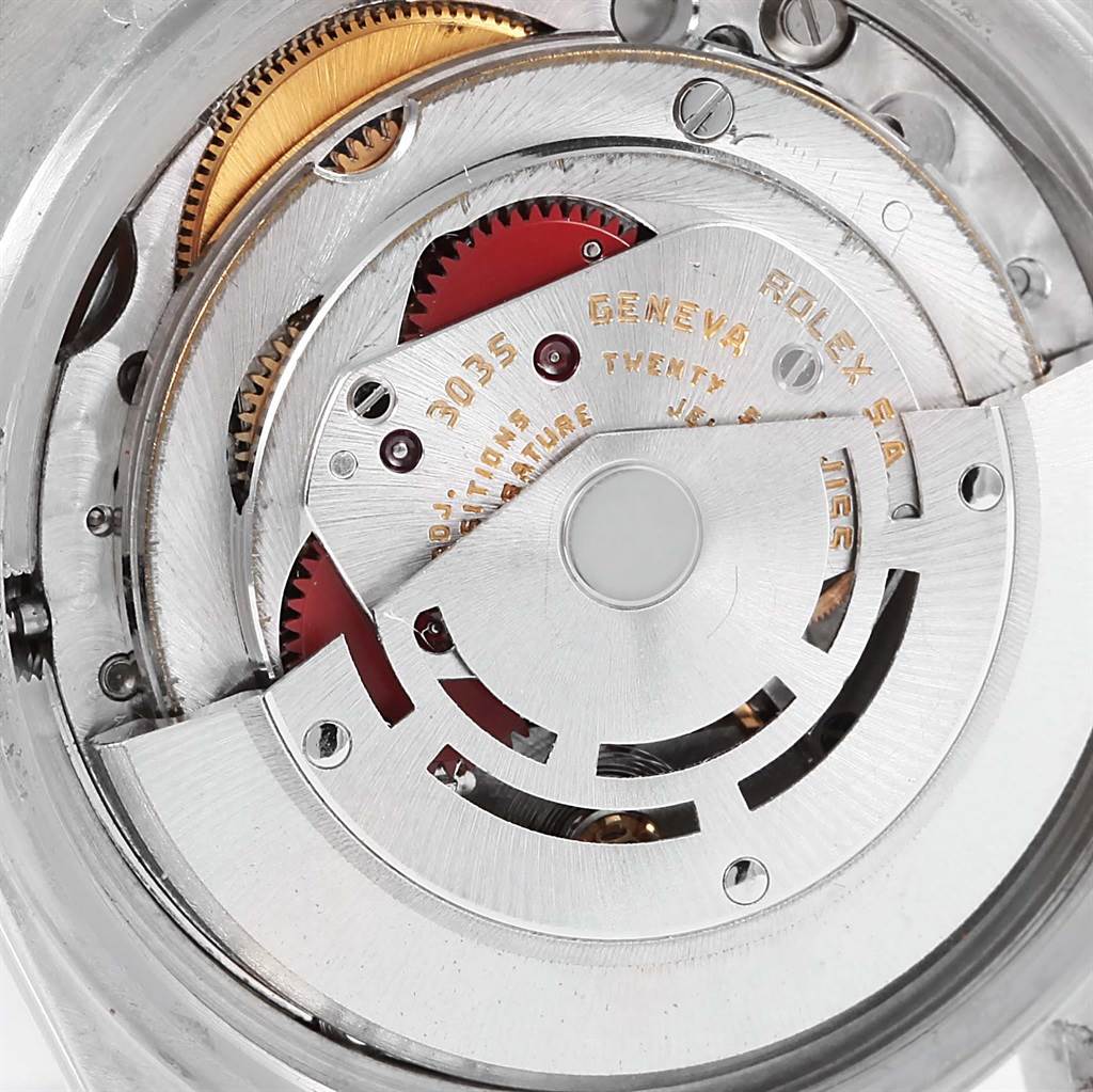 This close-up shows the intricate internal mechanism of the Rolex Vintage Collection 16013 Men's Stainless Steel Champagne Dial 16013 Men's Stainless Steel Champagne Dial model.