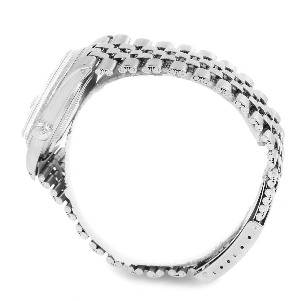 The side view of the Rolex Vintage Collection 1601 Men's Stainless Steel Silver Dial 1601 Men's Stainless Steel Silver Dial watch shows its metal bracelet and case.