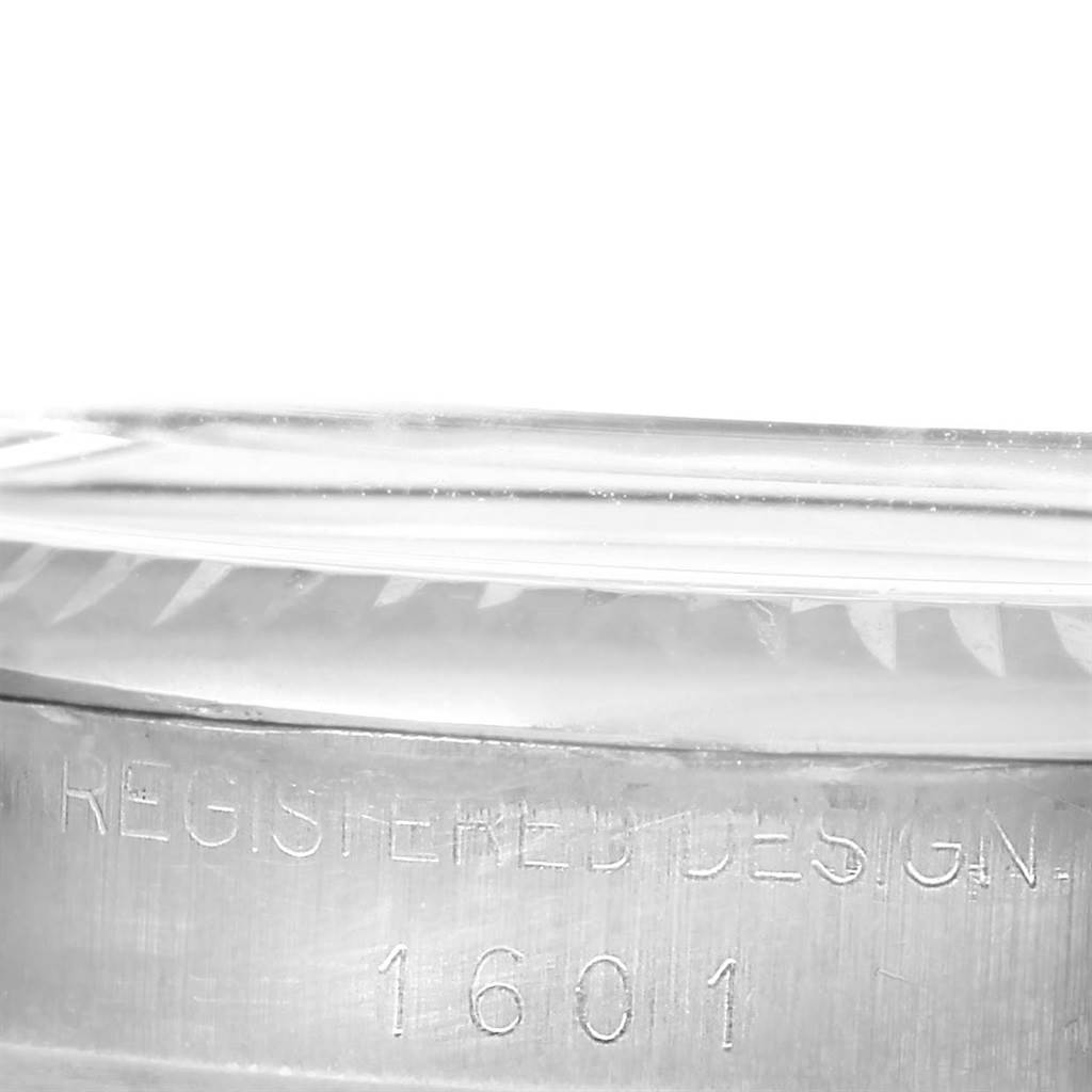 This image shows a close-up of the case side and bezel of a Rolex Vintage Collection 1601 Men's Stainless Steel Silver Dial 1601 Men's Stainless Steel Silver Dial model 1601.