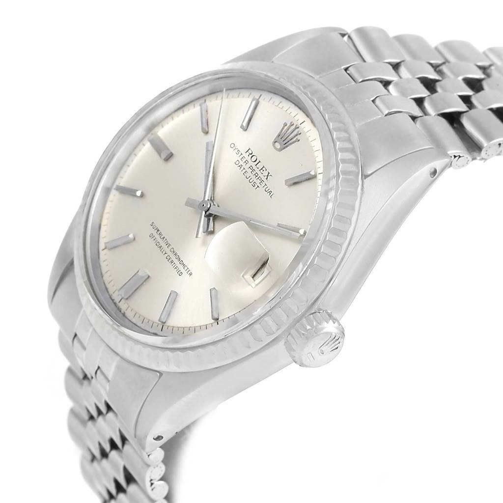 This image showcases a side angle of the Rolex Vintage Collection 1601 Men's Stainless Steel Silver Dial 1601 Men's Stainless Steel Silver Dial model, highlighting the dial, crown, and part of the bracelet.