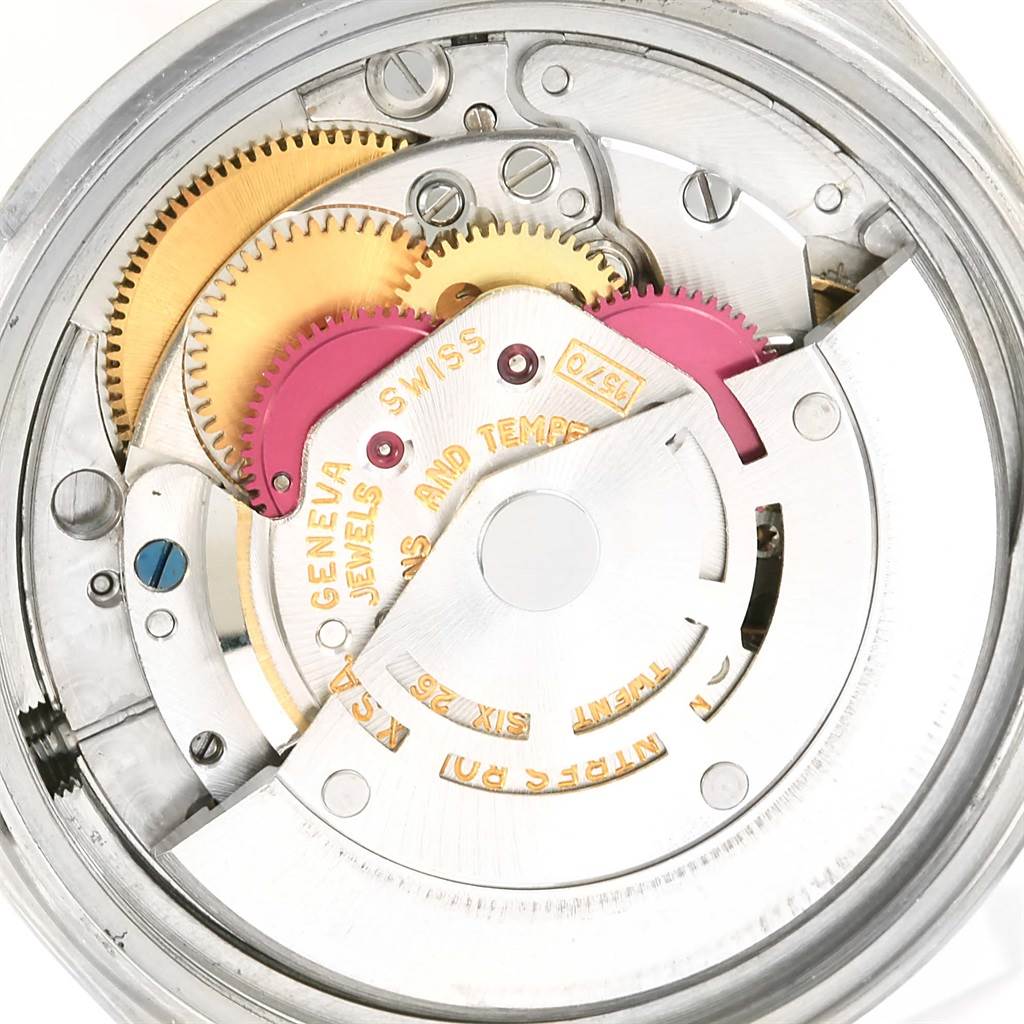 The image shows an overhead view of the inner mechanism of the Rolex Vintage Collection 1601 Men's Stainless Steel Silver Dial 1601 Men's Stainless Steel Silver Dial watch.
