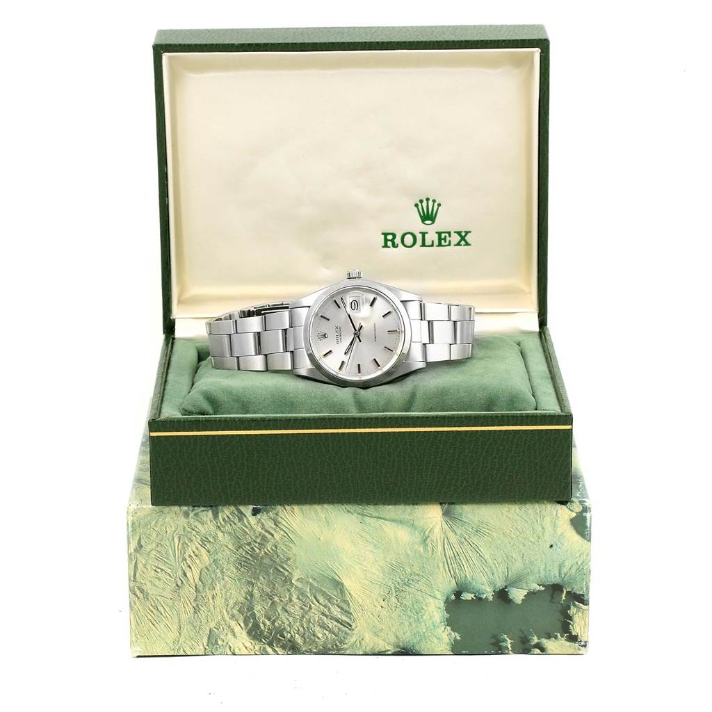 The Rolex Vintage Collection 6694 Men's Stainless Steel Silver Dial 6694 Men's Stainless Steel Silver Dial watch is shown from the front, displayed in its opened green box.
