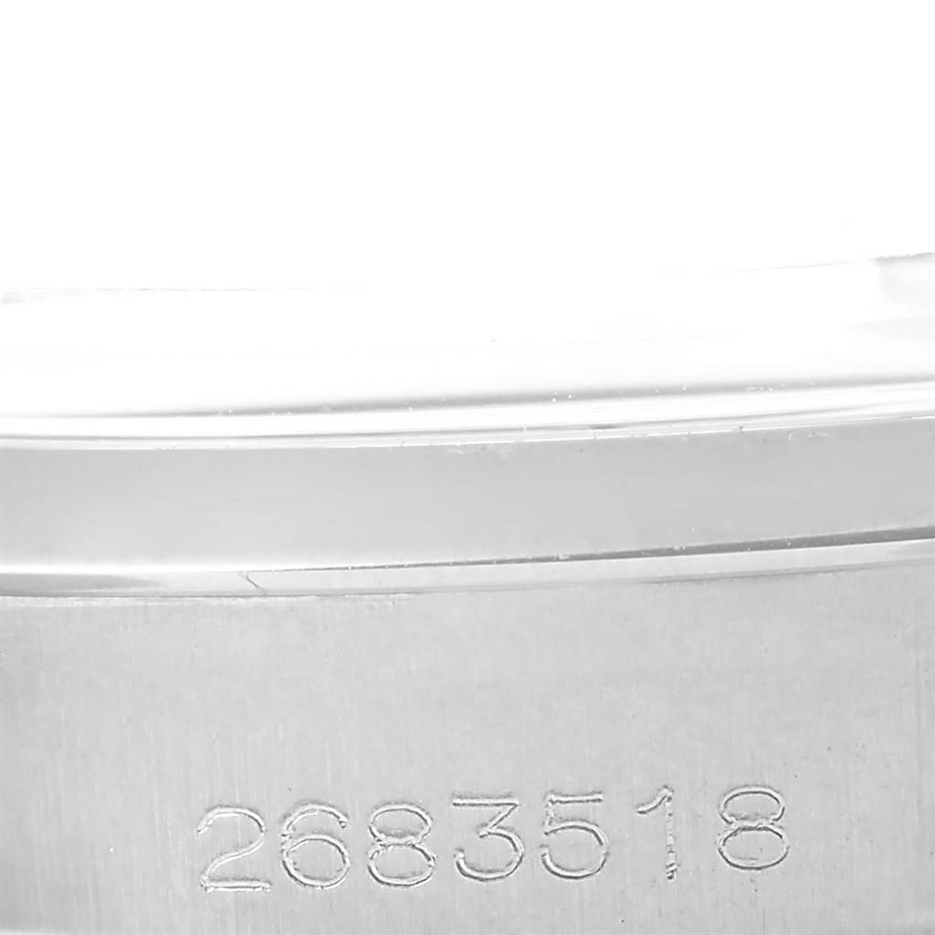 This image shows the serial number (2683518) engraved on the case of a Vintage Collection model by Rolex.