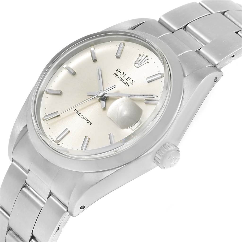 The watch is a Rolex Vintage Collection 6694 Men's Stainless Steel Silver Dial 6694 Men's Stainless Steel Silver Dial model shown at an angled view, displaying the dial, crown, and metal bracelet.