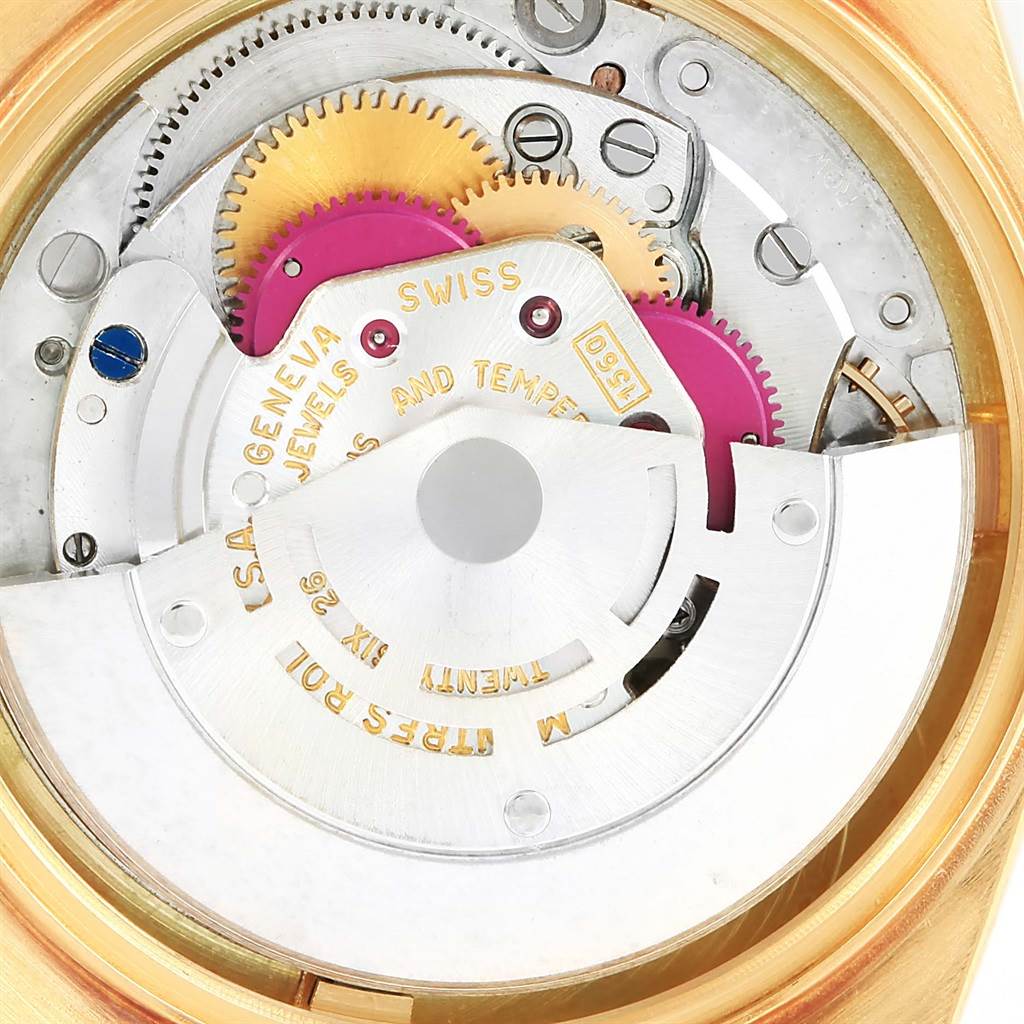 The image shows the intricate inner mechanical parts of the Rolex Vintage Collection 1601 Men's Yellow Gold Champagne Dial 1601 Men's Yellow Gold Champagne Dial model watch.