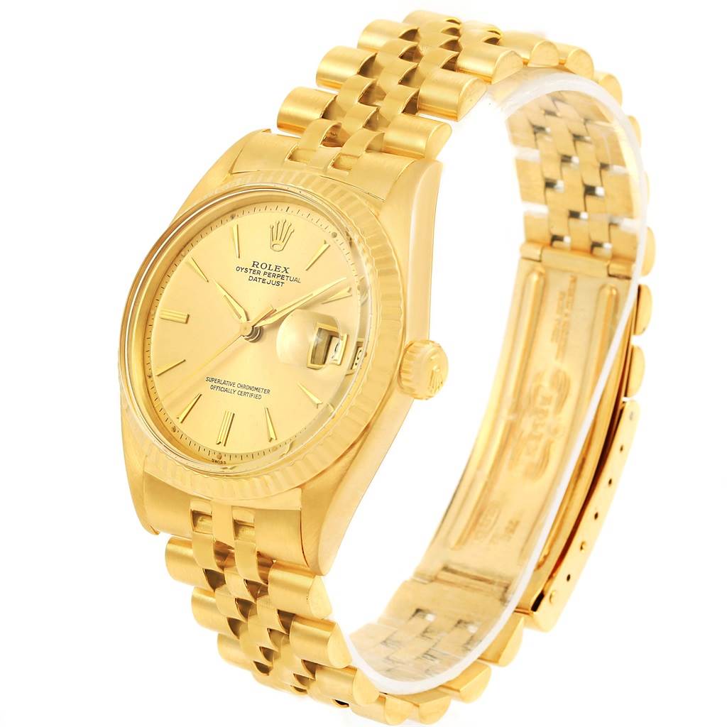 The image shows a Vintage Collection Rolex Oyster Perpetual Datejust watch, angled to display its gold face, bracelet, and clasp.