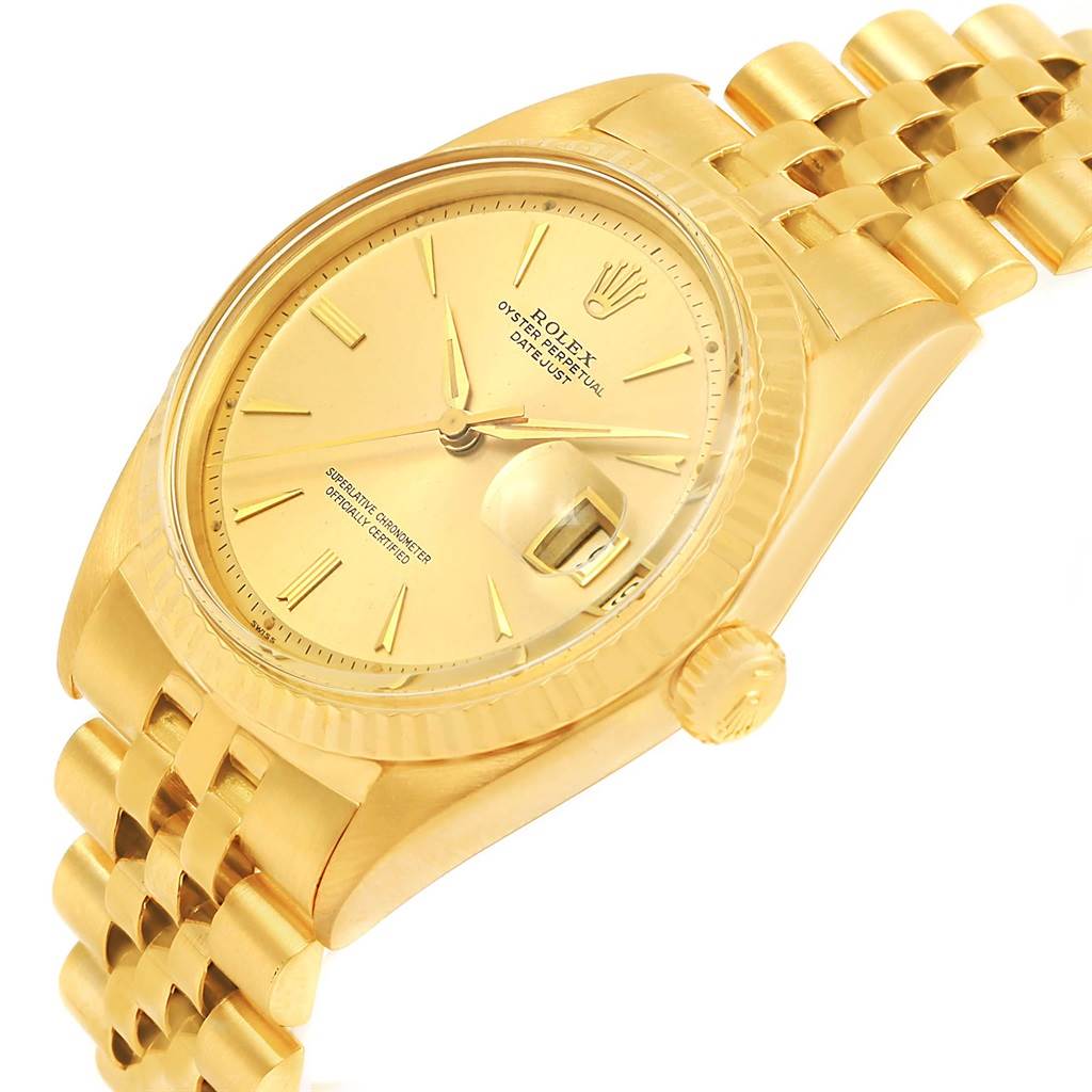 This image shows a Rolex Vintage Collection 1601 Men's Yellow Gold Champagne Dial 1601 Men's Yellow Gold Champagne Dial watch from an angled side view, featuring the dial, crown, and part of the bracelet.