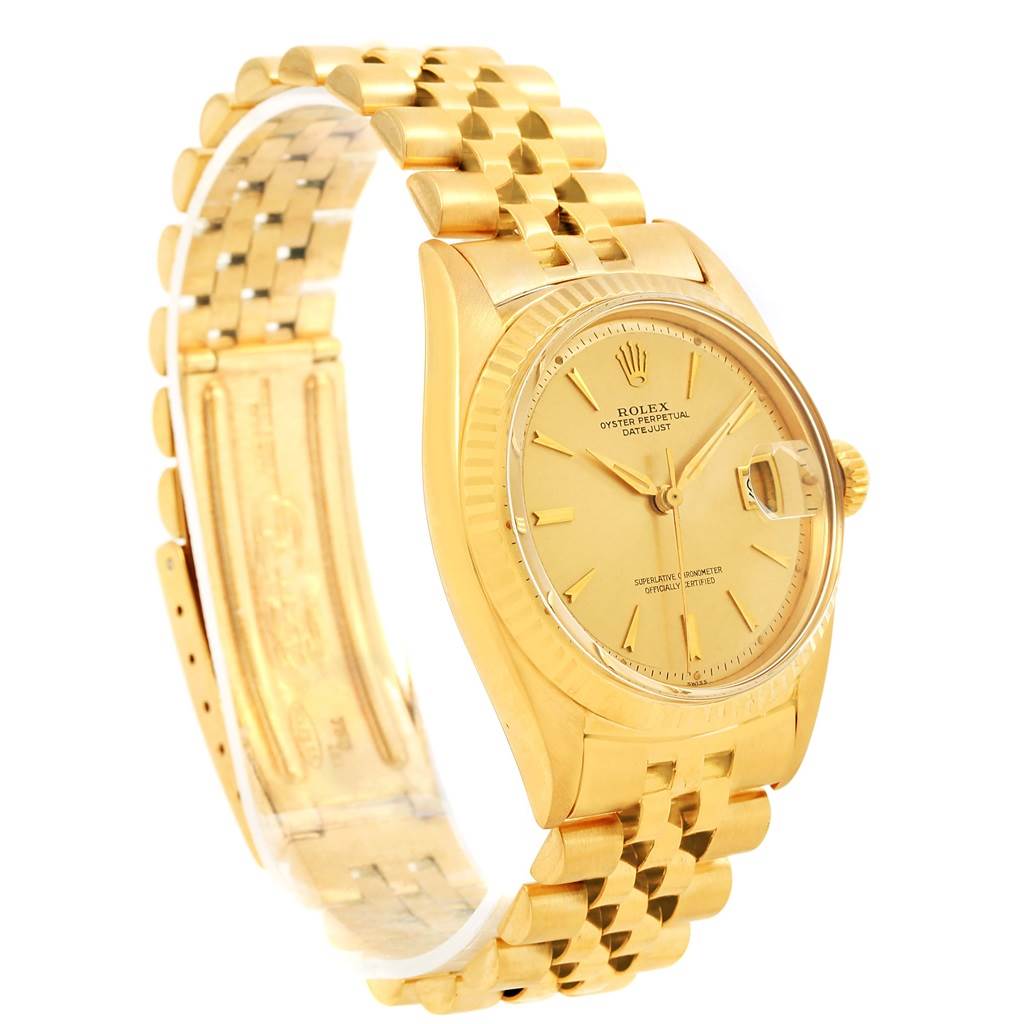 The image shows a side angle of the Rolex Vintage Collection 1601 Men's Yellow Gold Champagne Dial 1601 Men's Yellow Gold Champagne Dial watch, highlighting its gold casing, bracelet, and face details.