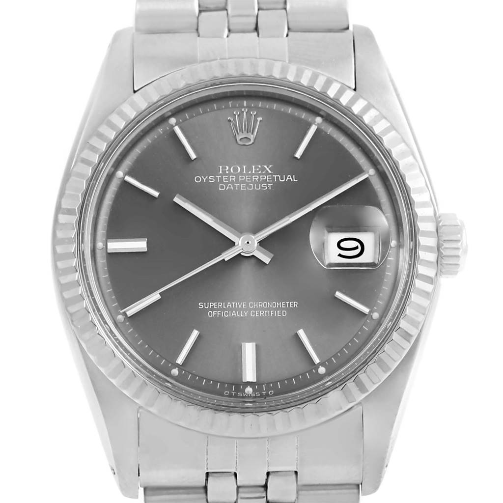 The image shows the face and part of the bracelet of a Rolex Vintage Collection 1601 Men's Stainless Steel Grey Dial 1601 Men's Stainless Steel Grey Dial Oyster Perpetual Datejust watch.