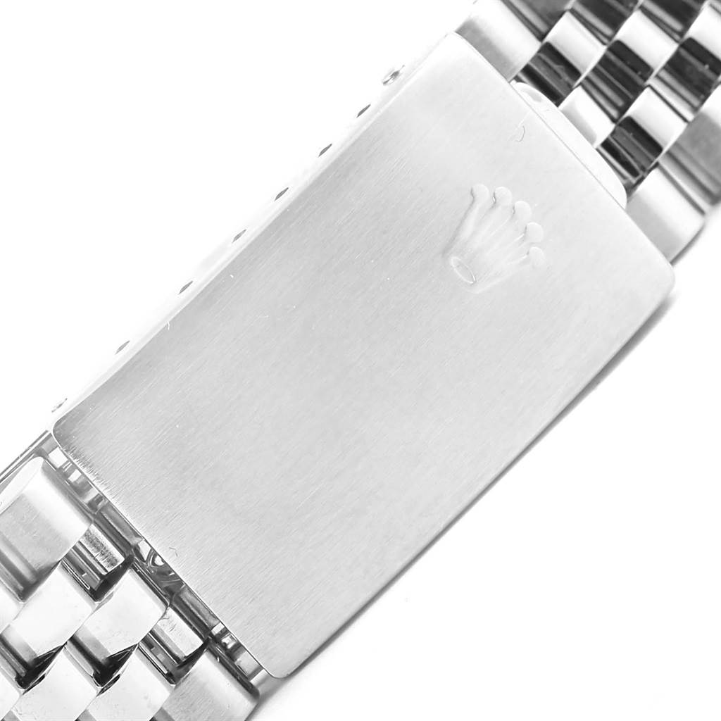 The image shows the clasp of the Rolex Vintage Collection 1601 Men's Stainless Steel Grey Dial 1601 Men's Stainless Steel Grey Dial model watch, featuring the brand's logo.
