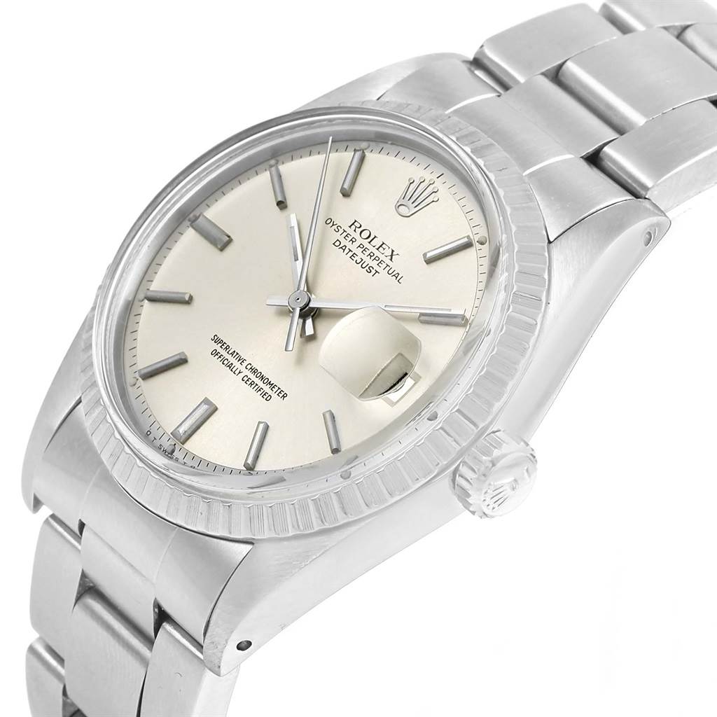 The Vintage Collection Rolex watch is shown at a three-quarter angle, highlighting the face, bezel, bracelet, and crown.
