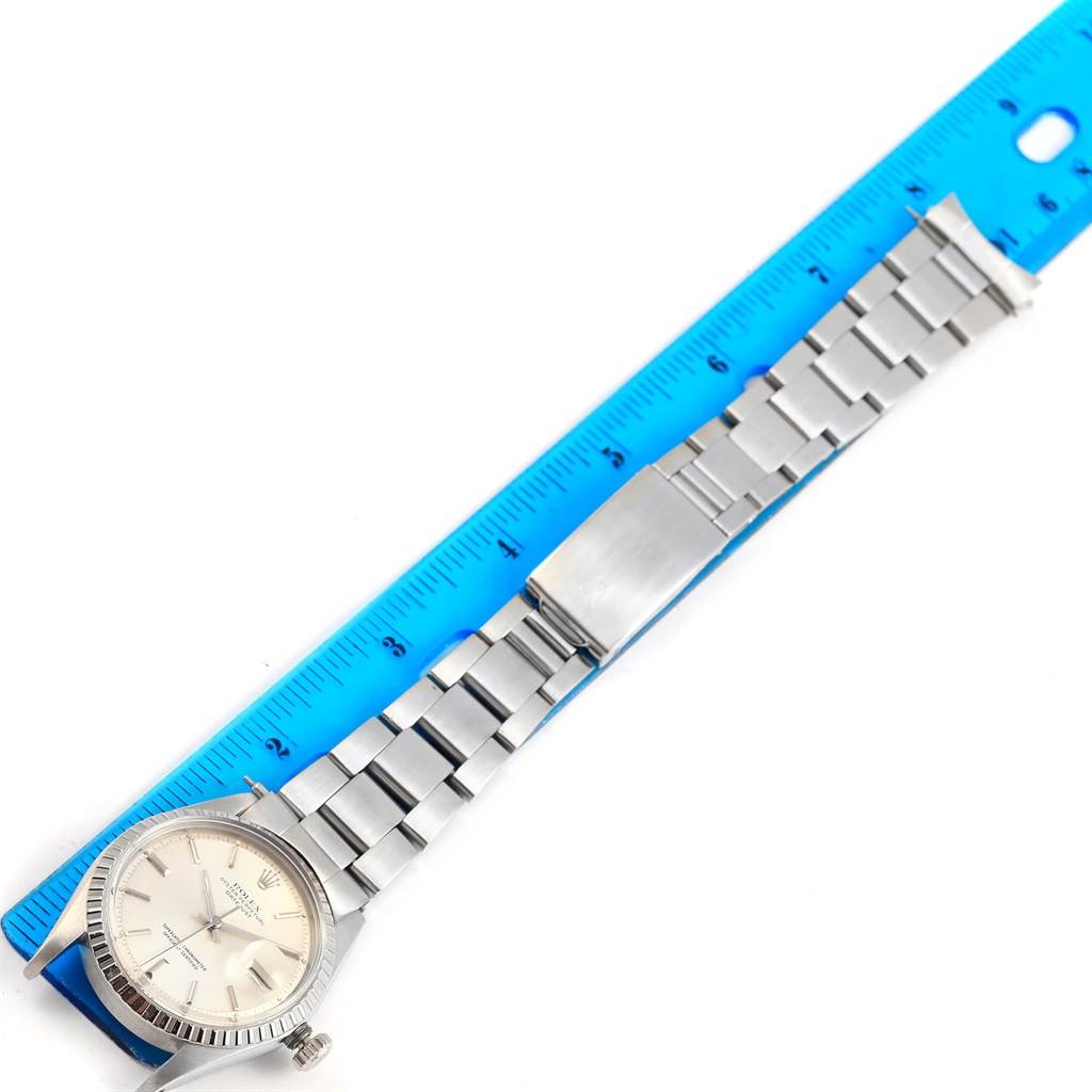 This image shows a top-down view of a Vintage Collection Rolex watch, displaying the watch face and metal strap.