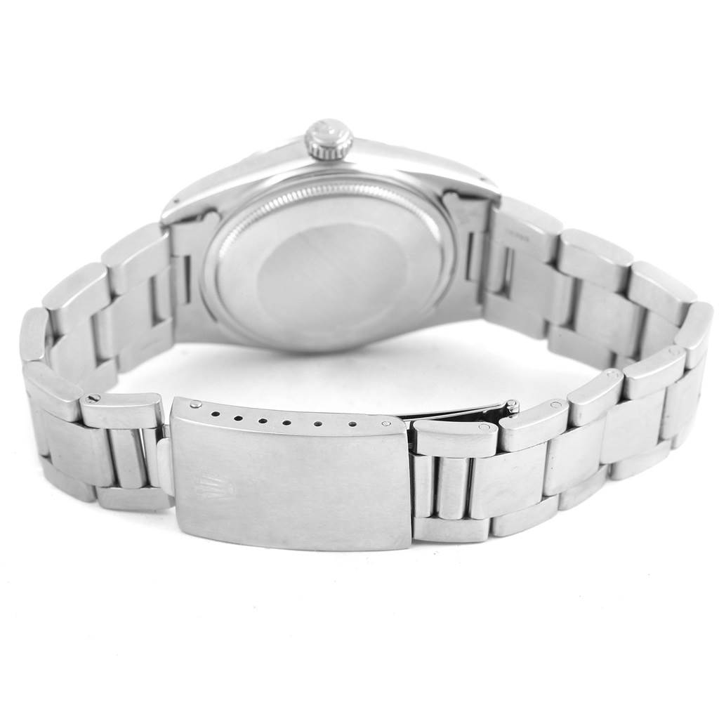 This image shows the back view of a Rolex Vintage Collection 16030 Men's Stainless Steel Grey Dial 16030 Men's Stainless Steel Grey Dial watch, focusing on the case back and the metal bracelet with the clasp.