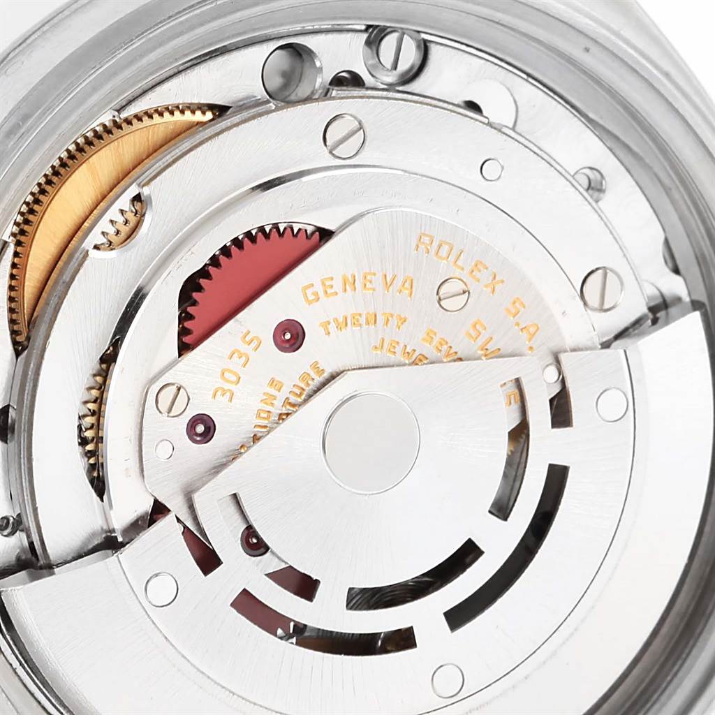 This close-up shows the internal mechanical movement of the Rolex Vintage Collection 16030 Men's Stainless Steel Grey Dial 16030 Men's Stainless Steel Grey Dial watch, highlighting gears and engraved details.
