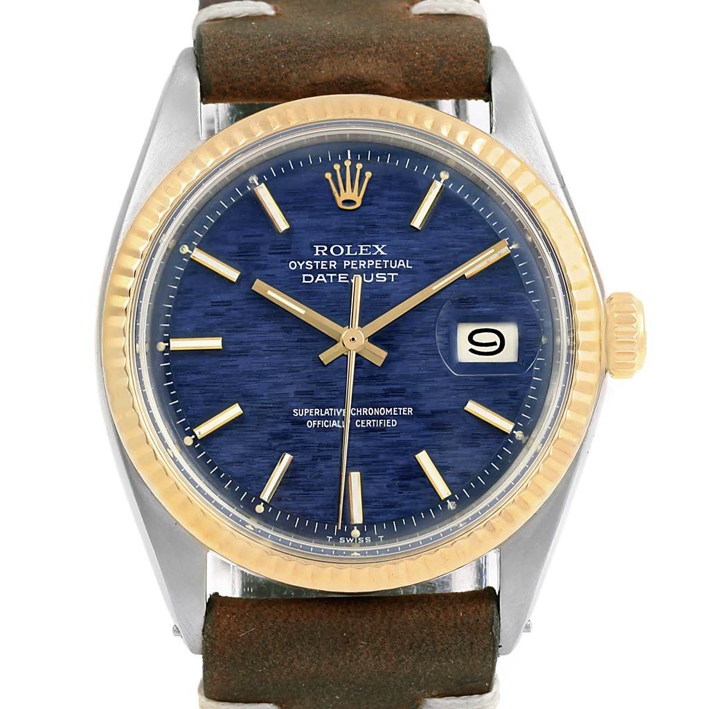 This is a Rolex Vintage Collection 1601 Men's Steel and Gold (two tone) Blue Dial 1601 Men's Steel and Gold (two tone) Blue Dial Datejust watch showing a front view of the face, bezel, and leather strap.