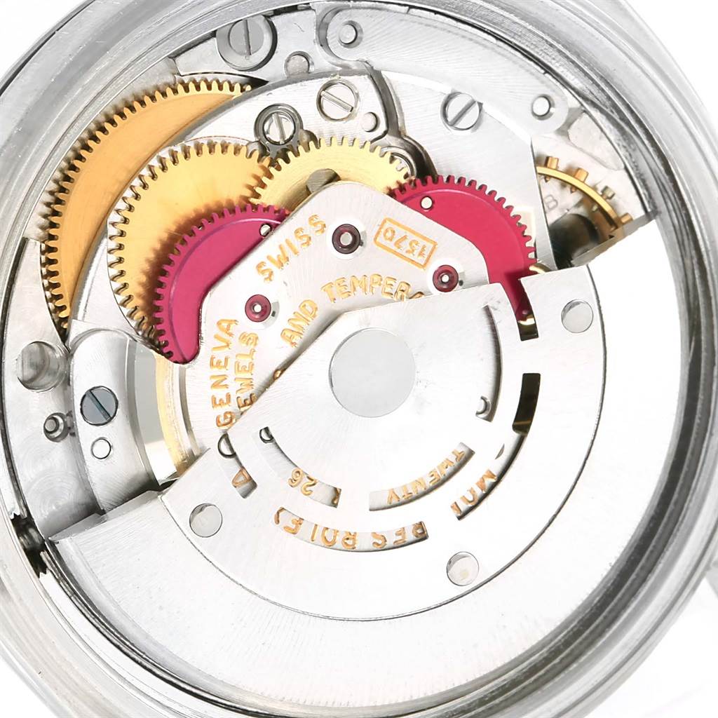 This image shows the internal mechanical movement and gears of a Rolex Vintage Collection 1603 Men's Stainless Steel Silver Dial 1603 Men's Stainless Steel Silver Dial watch viewed from close-up.