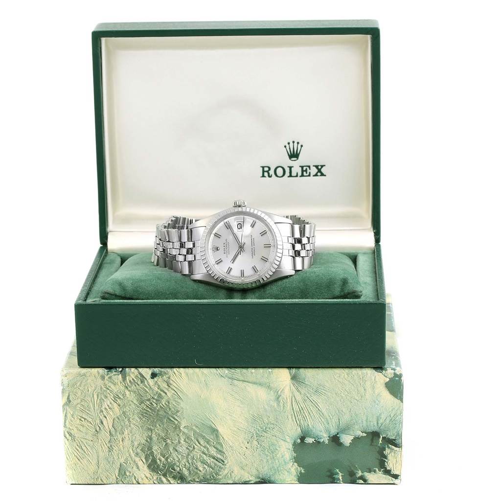 The Rolex Vintage Collection 1603 Men's Stainless Steel Silver Dial 1603 Men's Stainless Steel Silver Dial watch is displayed front-facing inside its open green box.