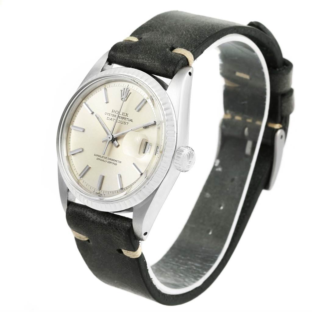 The Rolex Vintage Collection 1601 Men's Stainless Steel Silver Dial 1601 Men's Stainless Steel Silver Dial watch is shown at a slight angle, showcasing the face, bezel, and a portion of the leather strap.