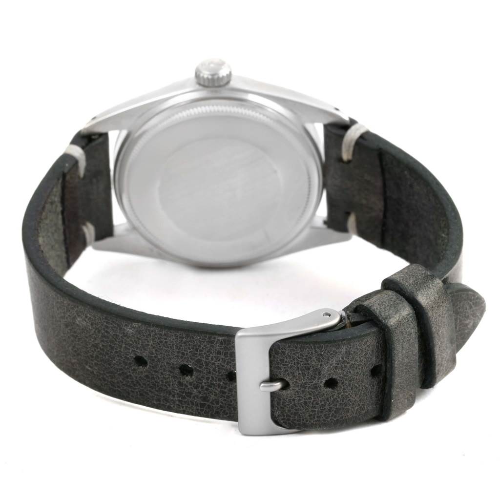 The image shows the back case and leather strap of the Rolex Vintage Collection 1601 Men's Stainless Steel Silver Dial 1601 Men's Stainless Steel Silver Dial model watch from a rear angle.