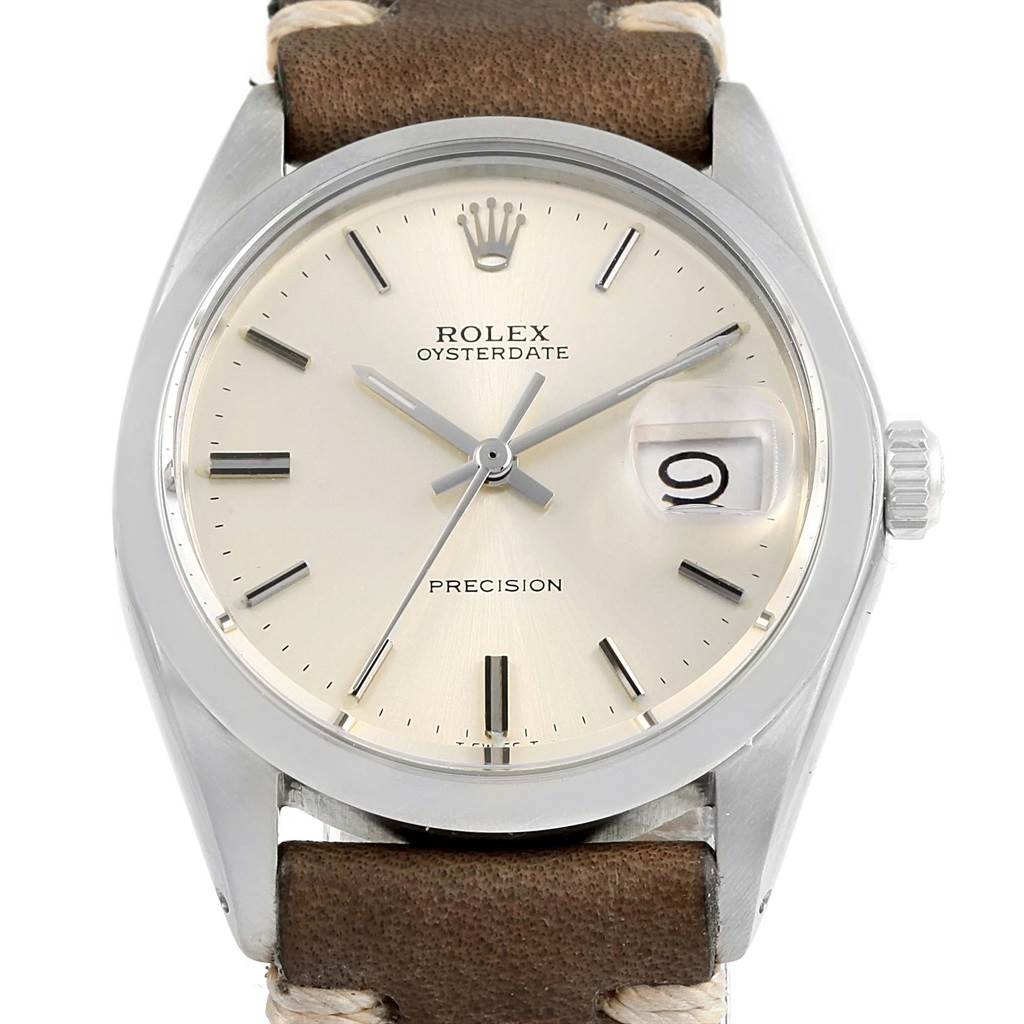 This image shows a front view of the Rolex Vintage Collection 6694 Men's Stainless Steel Silver Dial 6694 Men's Stainless Steel Silver Dial Oysterdate watch, highlighting the dial, hands, date, and crown.