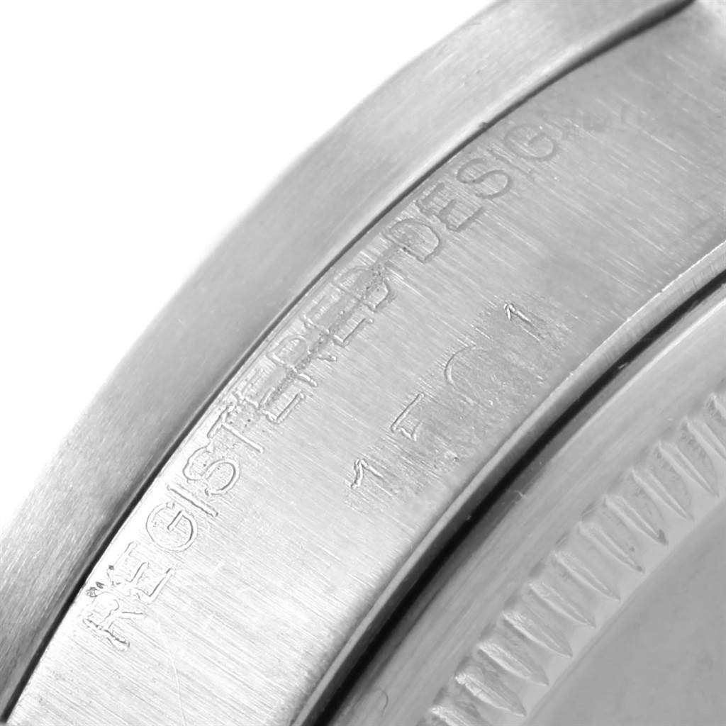 This close-up image shows the engraved bezel of a Vintage Collection model by Rolex.
