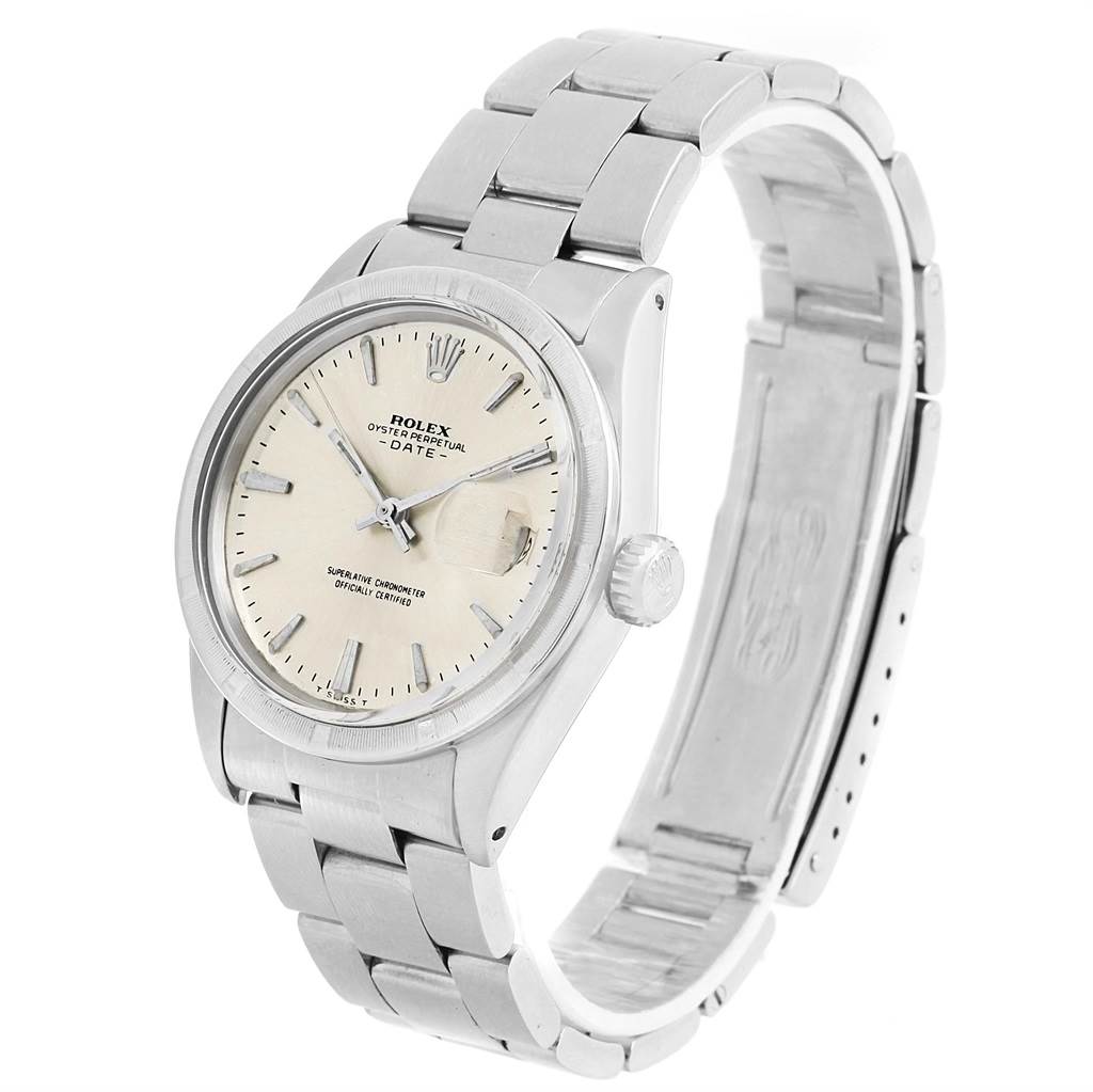 The Vintage Collection Rolex watch is shown at a slight angle, displaying its dial, bezel, crown, and bracelet.
