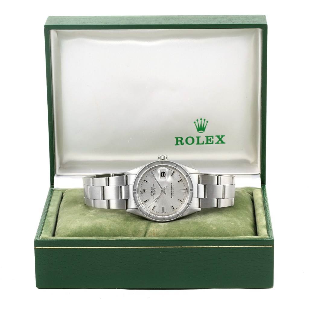 The Rolex Vintage Collection 1501 Men's Stainless Steel Silver Dial 1501 Men's Stainless Steel Silver Dial model watch is displayed in its open green box, showing the face, bezel, and bracelet.