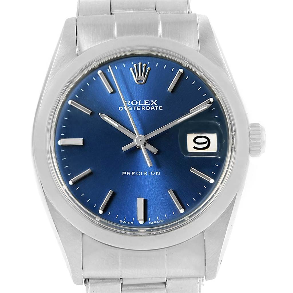 This is a front view of the Rolex Vintage Collection 6694 Men's Stainless Steel Blue Dial 6694 Men's Stainless Steel Blue Dial model showing the face, dial, date, and part of the metal wristband.