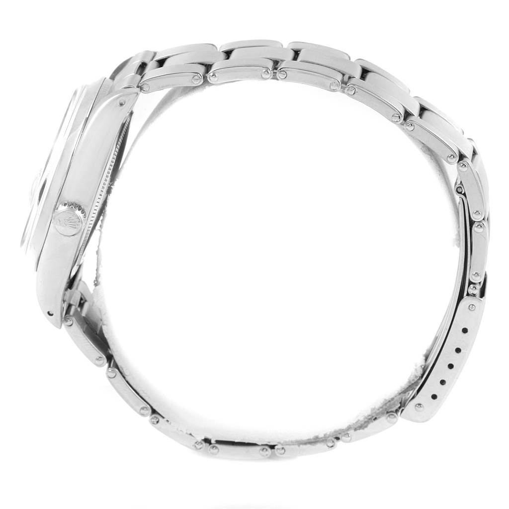 The Rolex Vintage Collection 6694 Men's Stainless Steel Blue Dial 6694 Men's Stainless Steel Blue Dial watch is shown in a side view, displaying the case, crown, and bracelet links.