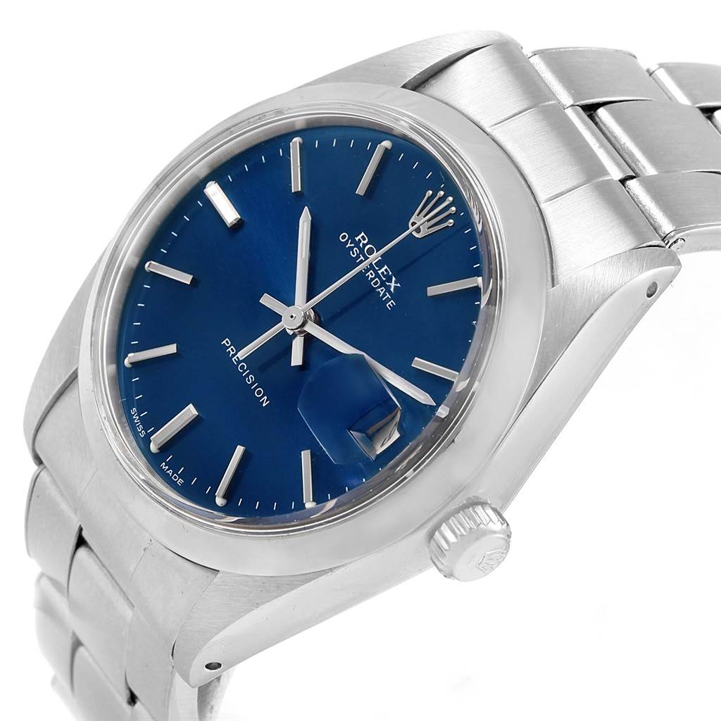 This image shows a Rolex Vintage Collection 6694 Men's Stainless Steel Blue Dial 6694 Men's Stainless Steel Blue Dial model from an angled side view, highlighting its blue dial, crown, and bracelet.
