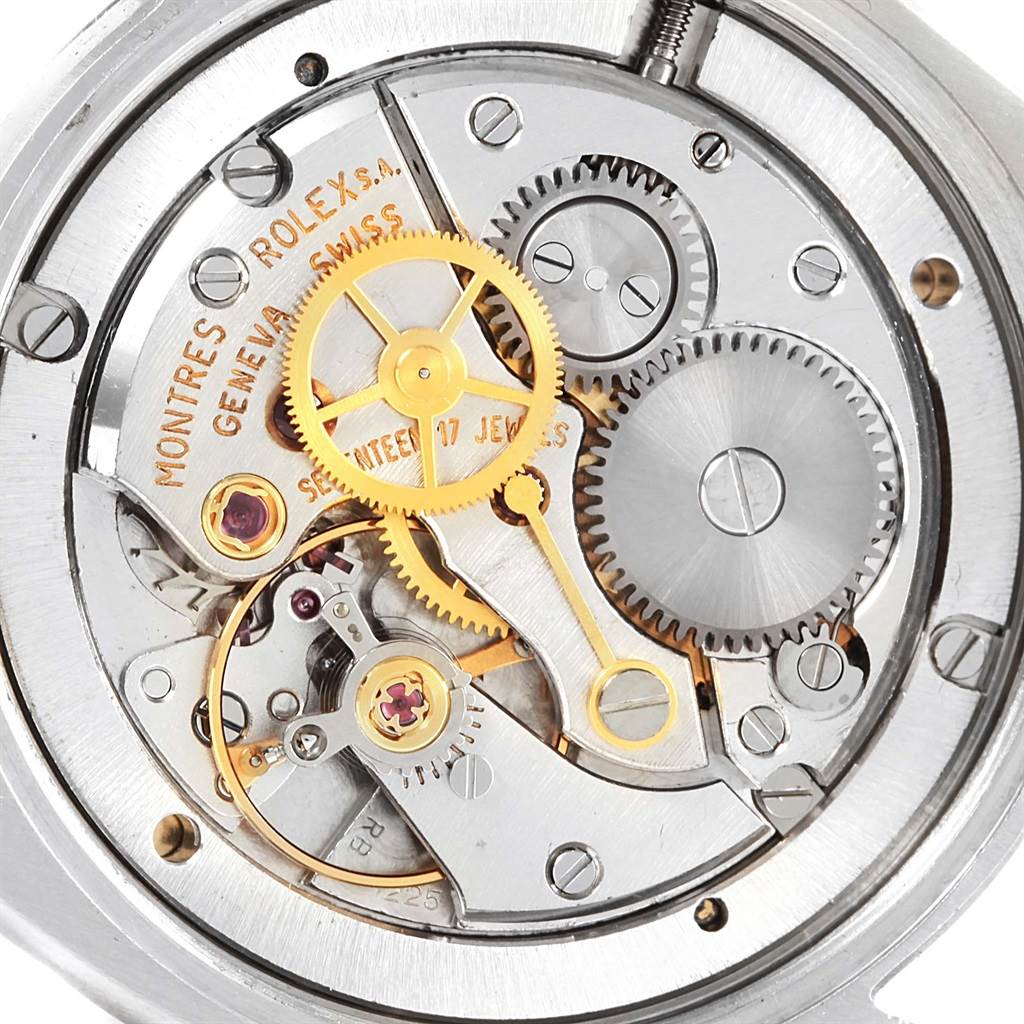 This image shows a close-up of the internal mechanism and gears of a Rolex Vintage Collection 6694 Men's Stainless Steel Blue Dial 6694 Men's Stainless Steel Blue Dial watch.