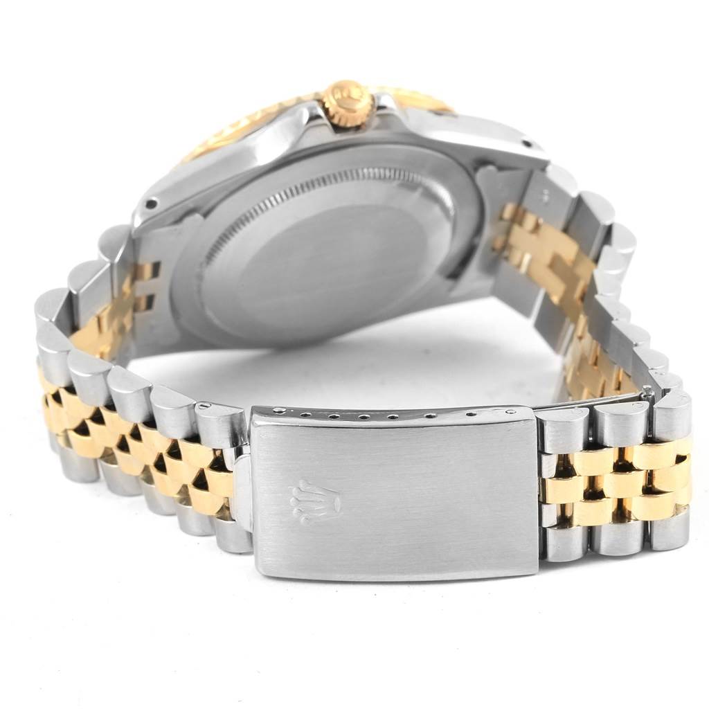 The image shows the back and clasp of a Rolex Vintage Collection 16753 Men's Stainless Steel Black Dial 16753 Men's Stainless Steel Black Dial watch, highlighting its bicolor metal bracelet.