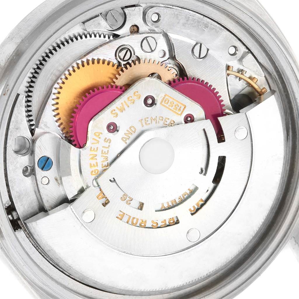 The image shows the intricate internal mechanism and gears of a Rolex Vintage Collection 1603 Men's Stainless Steel Silver Dial 1603 Men's Stainless Steel Silver Dial watch from a back angle.
