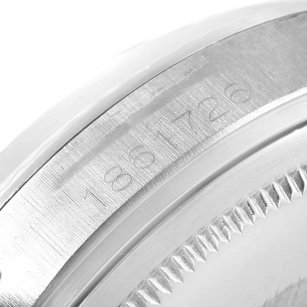 This image shows a close-up of the engraved serial number on the case side of the Vintage Collection model by Rolex.