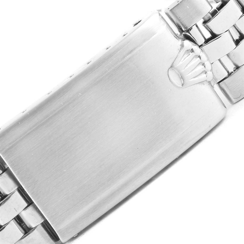 The image shows the clasp of a Rolex Vintage Collection 1601 Men's Stainless Steel Silver Dial 1601 Men's Stainless Steel Silver Dial model watch, highlighting its metal bracelet.