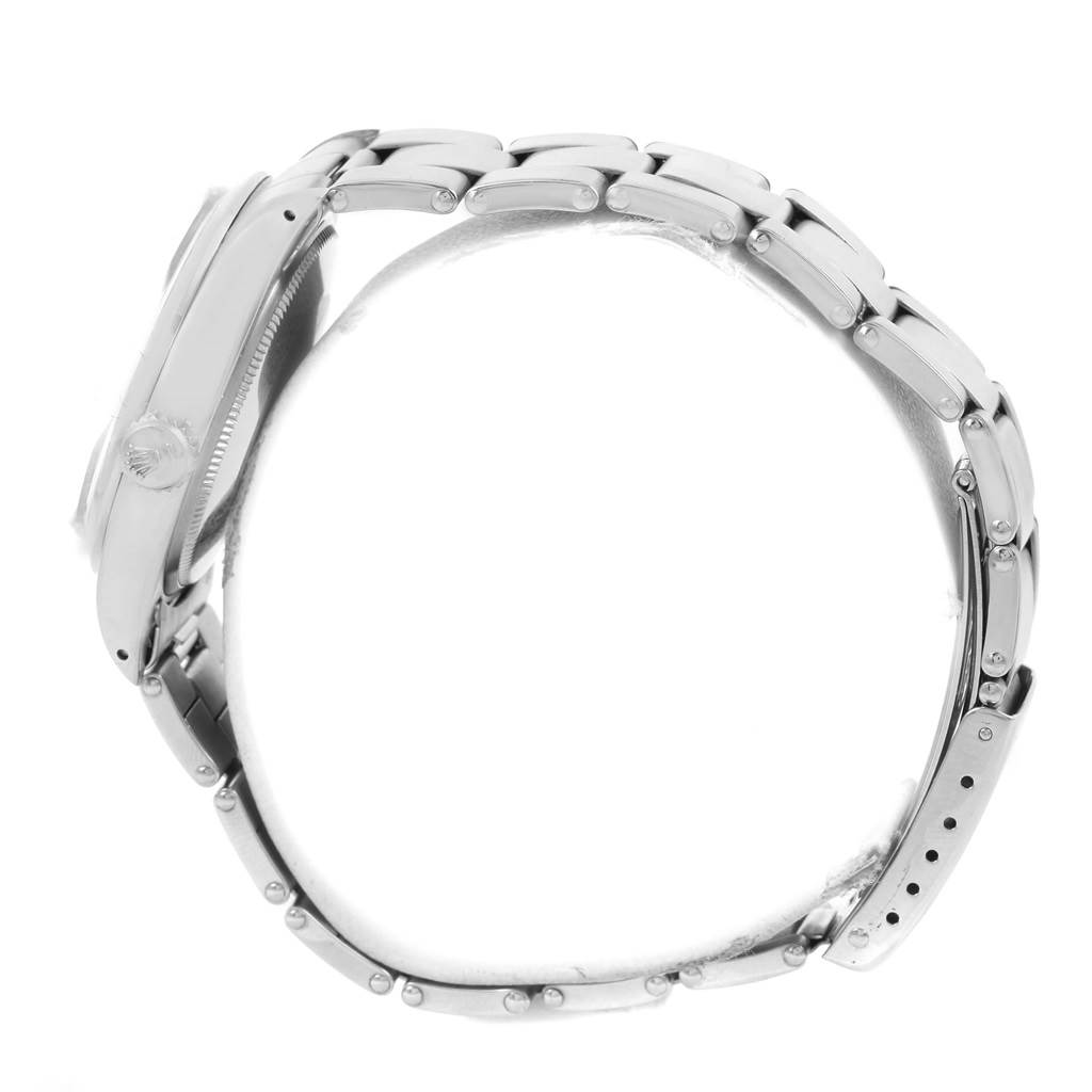 This image shows a side view of a Vintage Collection Rolex watch, displaying the case, crown, and the bracelet.