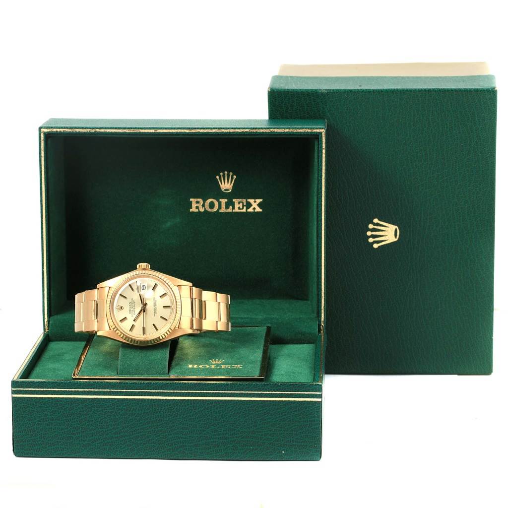 The image shows a Rolex Vintage Collection 1601 Men's Yellow Gold Silver Dial 1601 Men's Yellow Gold Silver Dial watch displayed in an open green Rolex box with the logo, featuring the watch dial, band, and case.