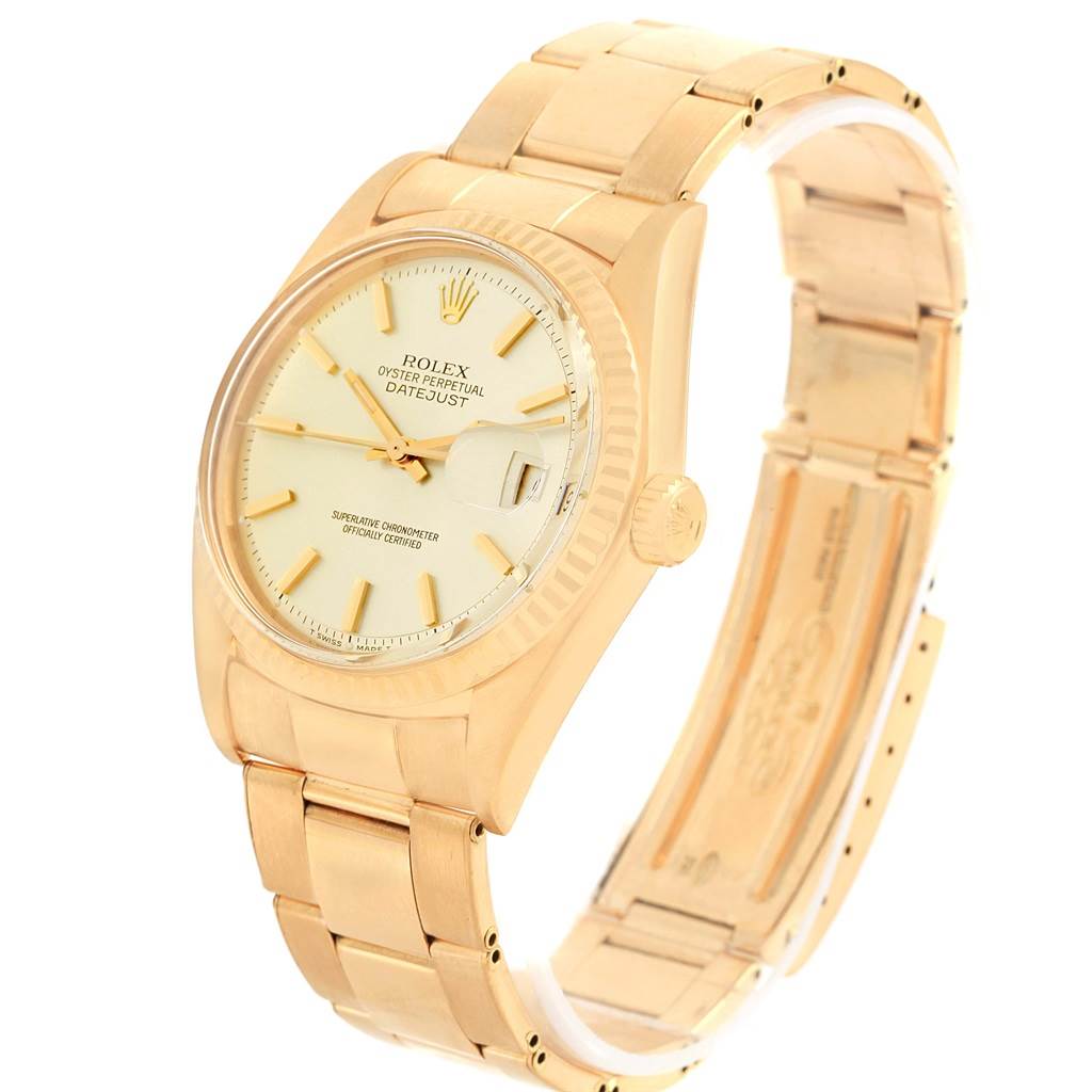 The Vintage Collection Rolex watch is shown at a slight angle, displaying the face, bezel, crown, and part of the bracelet.