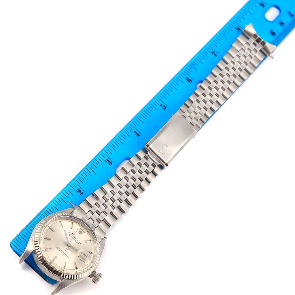 The Rolex Vintage Collection 1601 Men's Stainless Steel Silver Dial 1601 Men's Stainless Steel Silver Dial model watch is shown from an overhead angle, featuring the face, crown, and bracelet with a clasp.