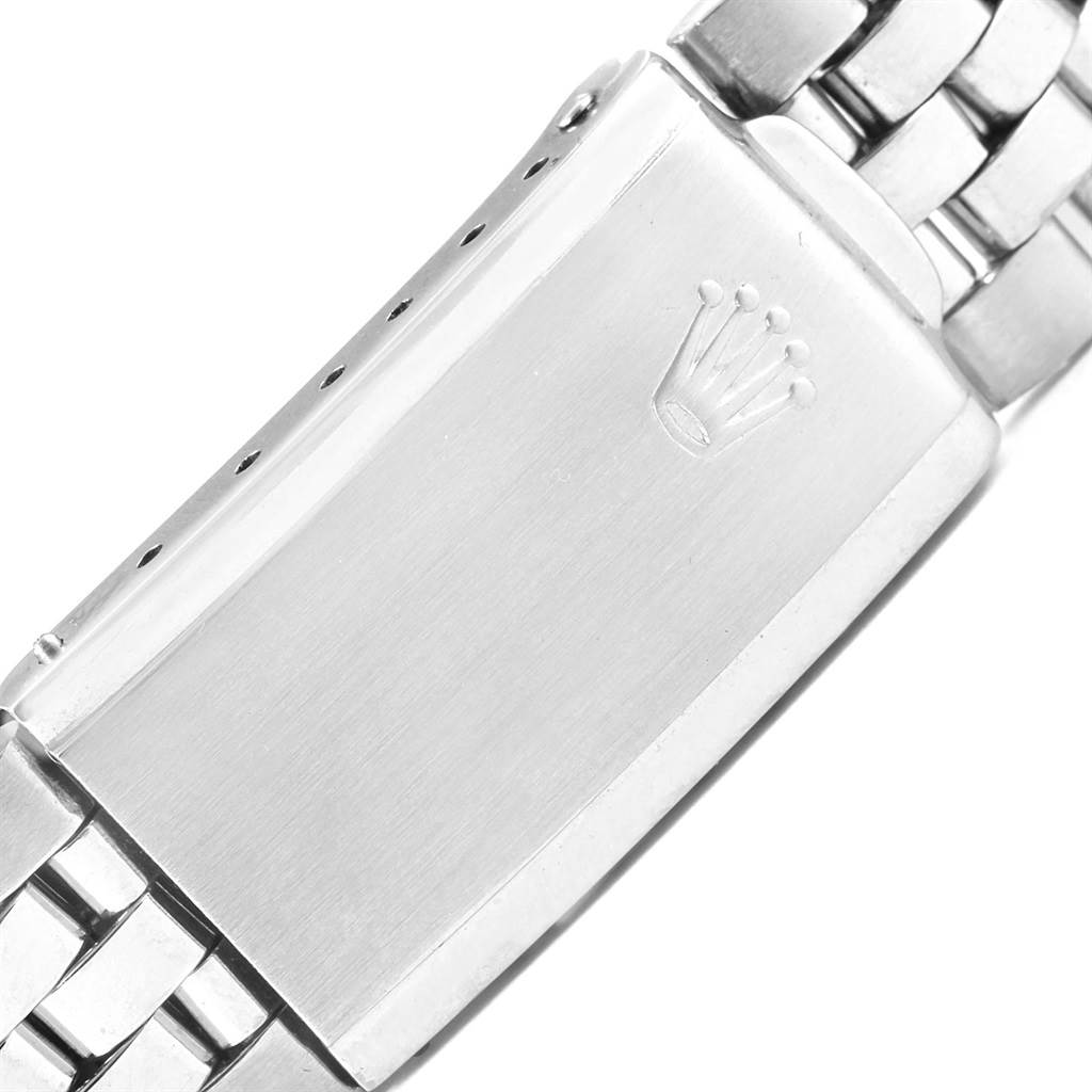 This image shows the clasp of a Rolex Vintage Collection 1601 Men's Stainless Steel Silver Dial 1601 Men's Stainless Steel Silver Dial watch, featuring the Rolex crown logo.
