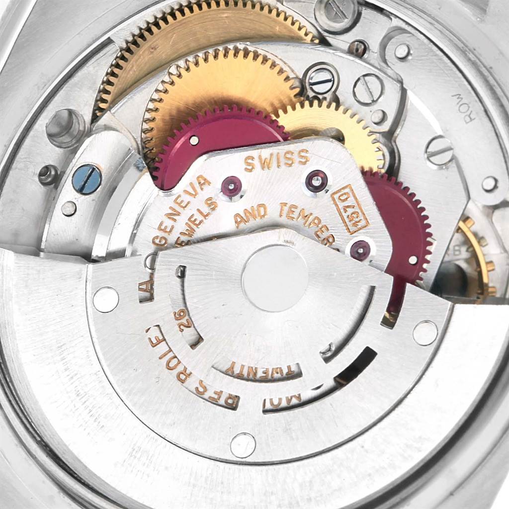 This close-up shows the intricate gears and mechanics of the Rolex Vintage Collection 1505 Men's Stainless Steel Champagne Dial 1505 Men's Stainless Steel Champagne Dial model's movement.
