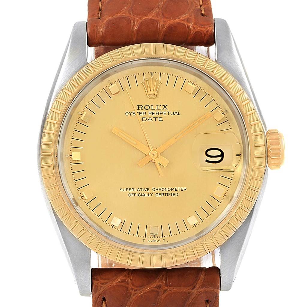 The image shows a front view of the Rolex Vintage Collection 1505 Men's Stainless Steel Champagne Dial 1505 Men's Stainless Steel Champagne Dial model watch with a gold bezel, leather strap, and date display.