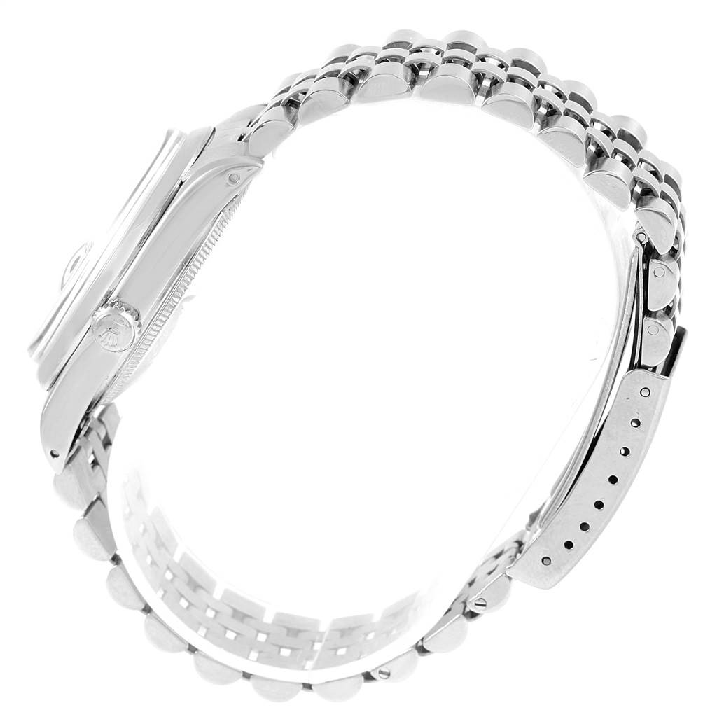 This image shows a side view of the Vintage Collection Rolex watch, highlighting the crown, case, and bracelet.