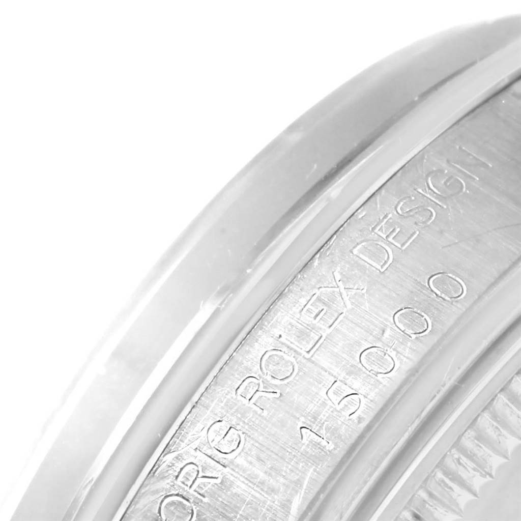 This image shows a close-up of the engraved bezel of the Rolex Vintage Collection 15000 Men's Stainless Steel Blue Dial 15000 Men's Stainless Steel Blue Dial model.