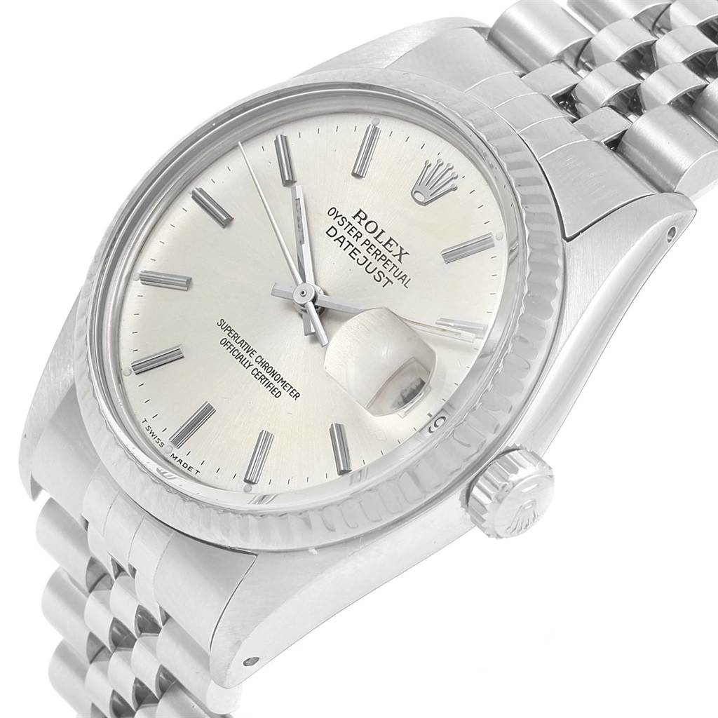 This image shows a 3/4 angle view of a Rolex Vintage Collection 16014 Men's Stainless Steel Silver Dial 16014 Men's Stainless Steel Silver Dial Oyster Perpetual Datejust, highlighting the dial, crown, and bracelet.