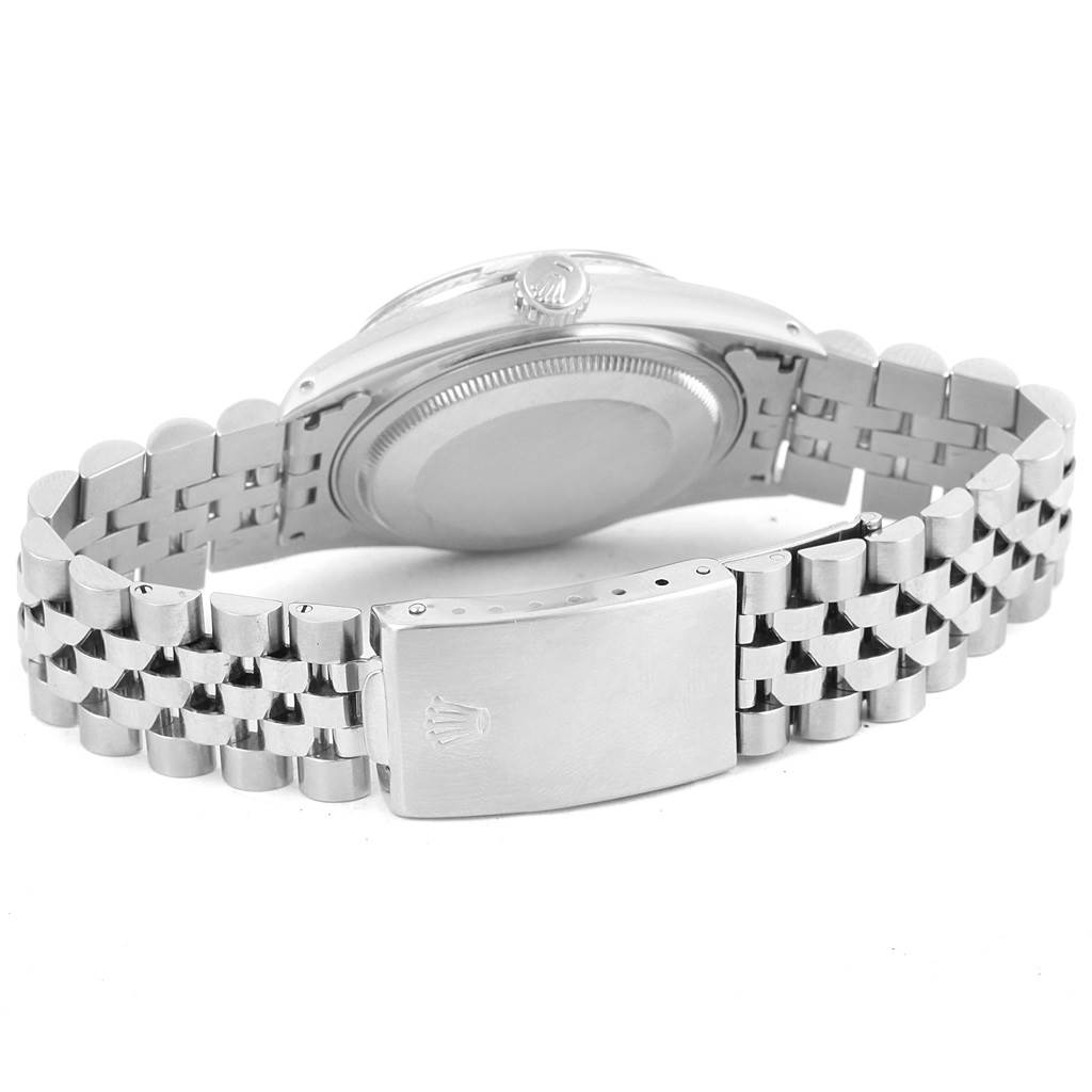 The image shows the backside and clasp of a Rolex Vintage Collection 16014 Men's Stainless Steel Silver Dial 16014 Men's Stainless Steel Silver Dial watch with a metallic bracelet.